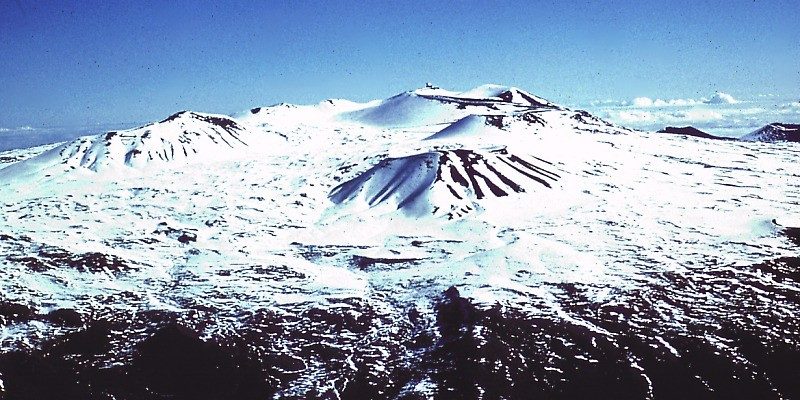 Measured from its base deep under the Pacific, Hawaii's Mauna Kea rises more than 33,500 feet. By that measure, NOAA says, it is taller than Mount Everest.