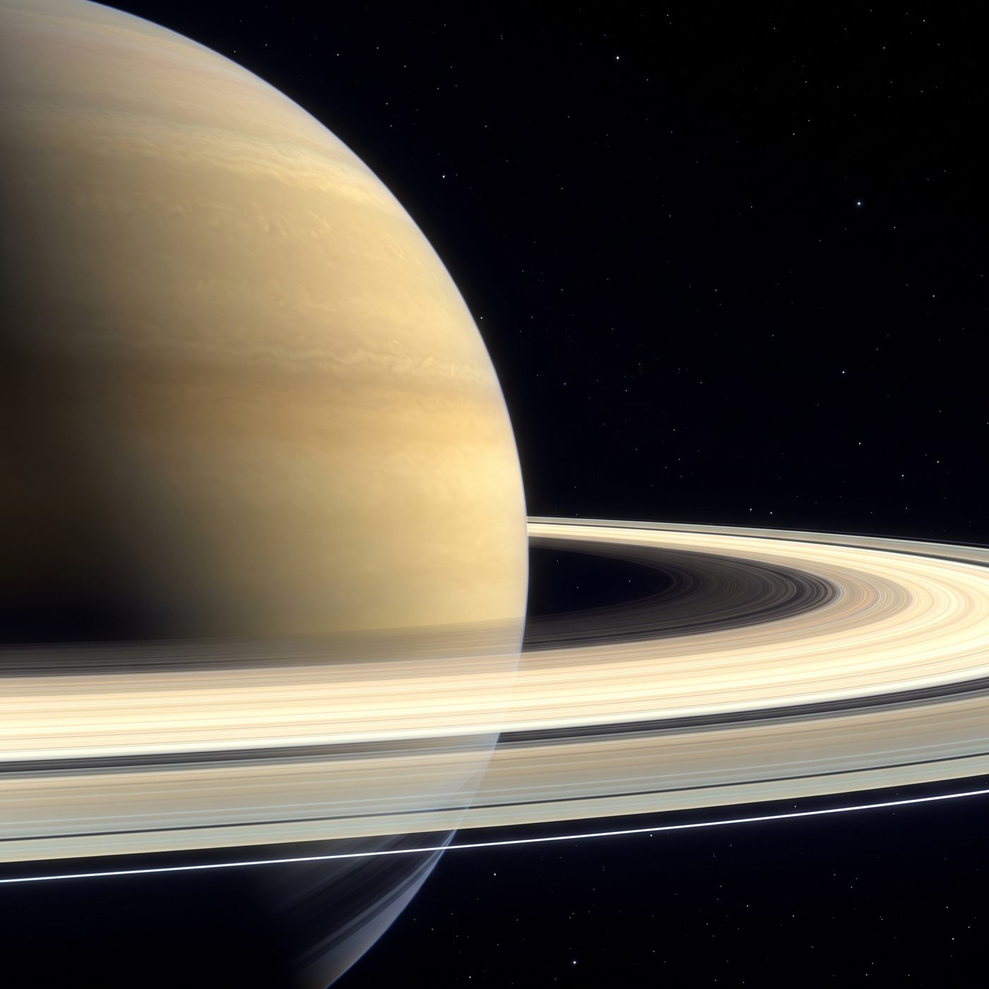 Saturn's rings stretch 175,000 miles across, yet the main rings are just 30 feet thick — thinner than a three-story house is tall.
